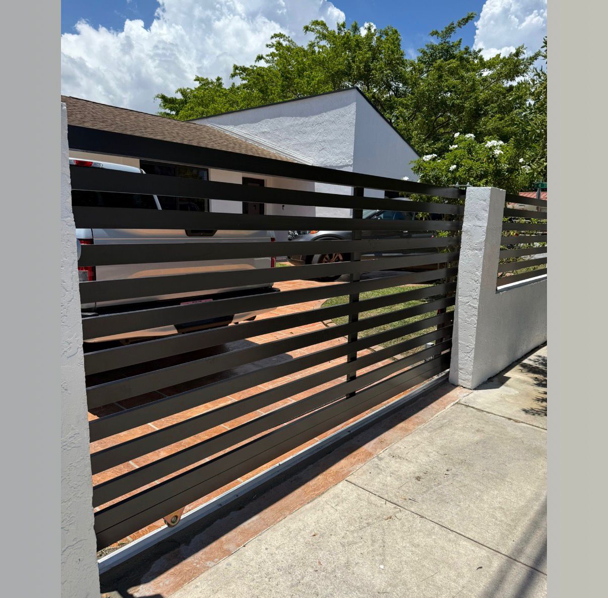 Metal gate after surface preparation, primer, and finish coating
